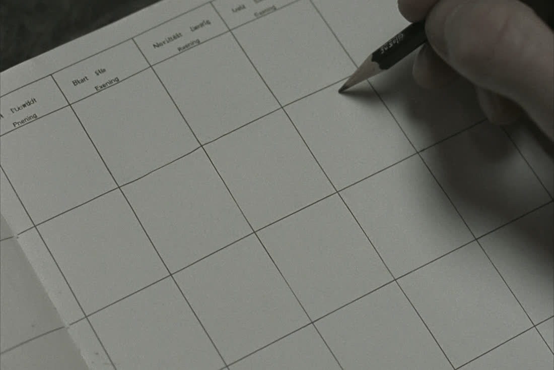 An open paper diary on a clinic desk