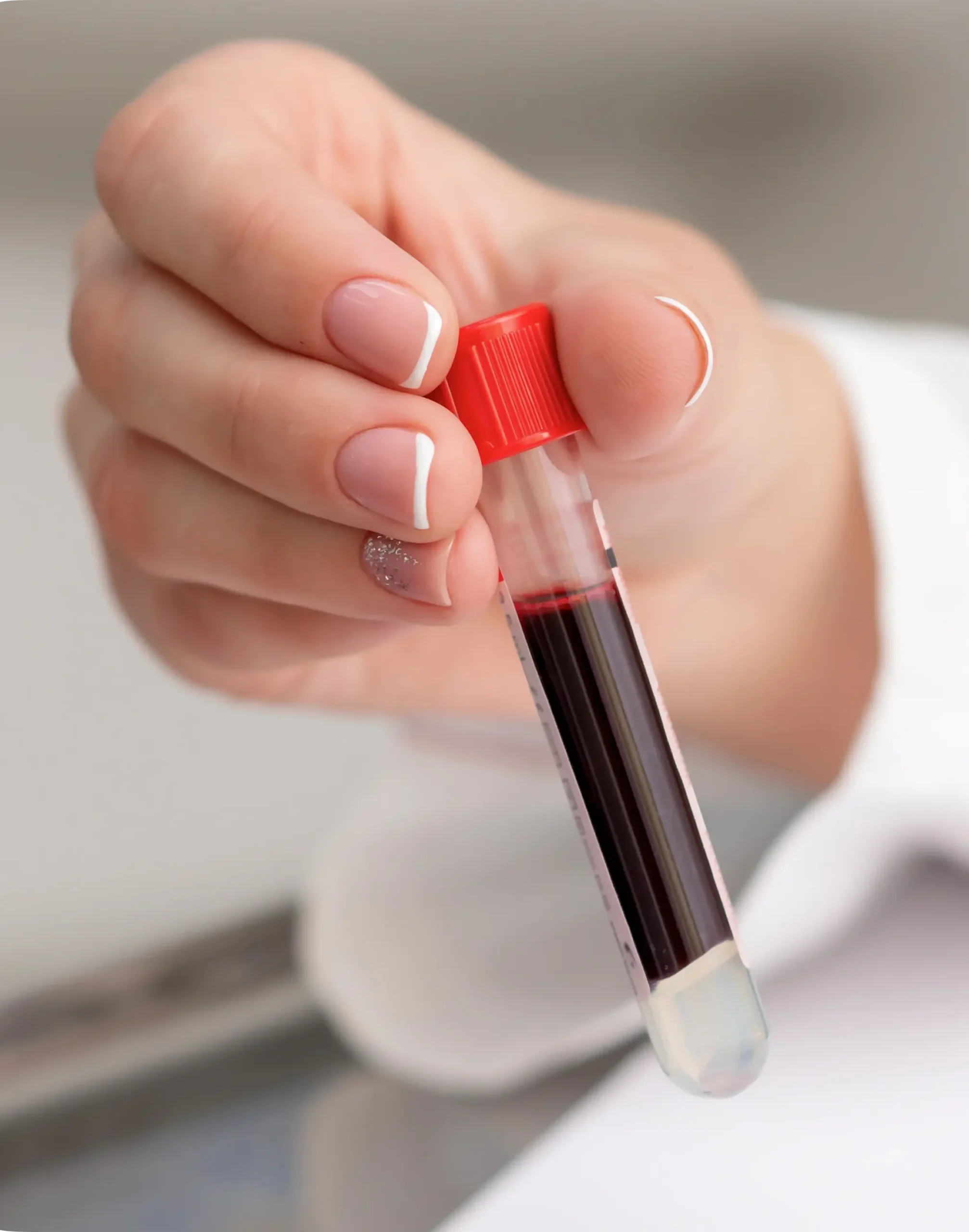 Blood sample tubes hands.